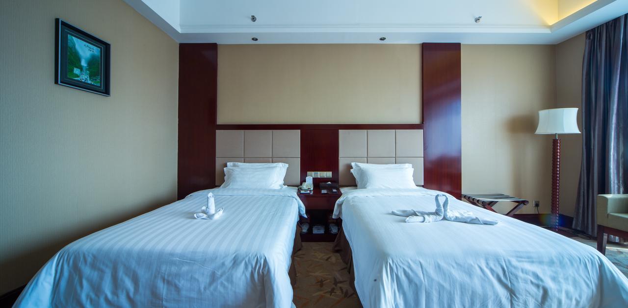 Da Cheng Shan Shui Hotel จางเจียเจี้ย ห้อง รูปภาพ